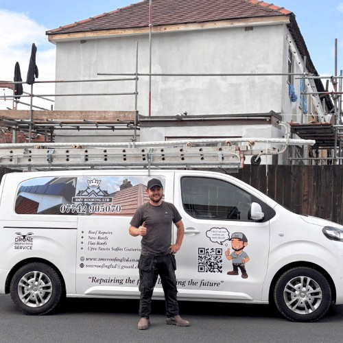 Shaun Varey standing beside the SMV Roofing Ltd van on a job